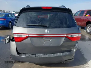 2012 Honda Odyssey EX-L with VIN 5FNRL5H60CB094682, listed as a IAAI auction lot 41570797 with 127,890 mi miles and . Bid and sale history available at carsss.com. Image 16.