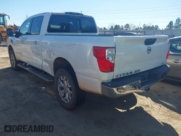 2016 Nissan Titan SL z VIN 1N6BA1F21GN504118, wystawiony jako IAAI lot #41729710 z przebiegiem 127 760 mil mil oraz . Historia ofert i sprzedaży dostępna na DreamBid. Obrazek 3.