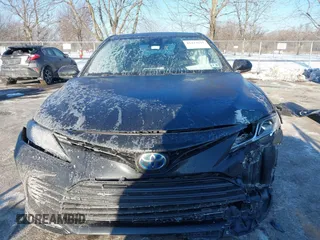 2021 Toyota Camry Hybrid LE with VIN 4T1C31AK6MU554826, listed as a IAAI auction lot 41413617 with 168,787 mi miles. Bid and sale history available at carsss.com. Image 13.