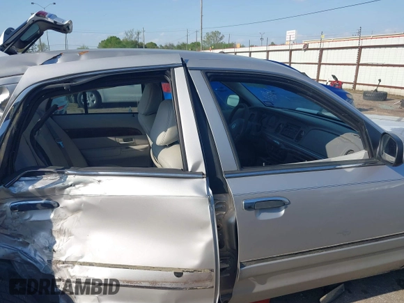 2004 Mercury Grand Marquis GS with VIN 2MEFM74W34X677247, listed as a IAAI auction lot 41856970 with 135,225 mi miles and . Bid and sale history available at DreamBid. Image 12.