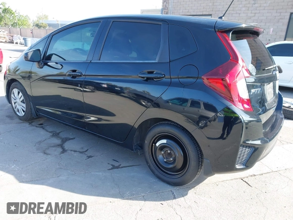 2015 Honda Fit LX with VIN 3HGGK5G5XFM737172, listed as a IAAI auction lot 42053332 with 80,690 mi miles. Bid and sale history available at carsss.com. Image 3.