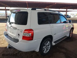 2006 Toyota Highlander Hybrid with VIN JTEEW21A660021527, listed as a IAAI auction lot 41757986 with 297,964 mi miles. Bid and sale history available at carsss.com. Image 4.