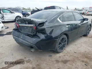 2017 Nissan Altima SR with VIN 1N4AL3AP2HN360514, listed as a IAAI auction lot 41946864 with 163,937 mi miles and . Bid and sale history available at carsss.com. Image 4.