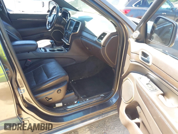 2014 Jeep Grand Cherokee Summit с VIN 1C4RJEJG7EC255828, выставлен на аукционе IAAI как лот 42343691 с пробегом 139 818 миль миль и . История ставок и продаж доступна на DreamBid. Изображение 5.