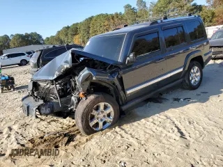 2007 Jeep Commander Limited with VIN 1J8HG58P57C672585, listed as a Copart auction lot 77384794 with 165,052 mi miles and Salvage Title. Bid and sale history available at carsss.com. Image 1.