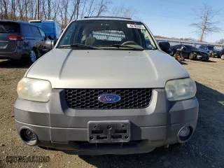 2006 Ford Escape XLT with VIN 1FMYU03136KA23230, listed as a Copart auction lot 48782825 with 142,302 mi miles and Salvage Title. Bid and sale history available at carsss.com. Image 5.