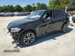 2015 BMW X5 xDrive35i with VIN 5UXKR0C57F0P15080, listed as a Copart auction lot 50720945 with 100,074 mi miles and Salvage Title. Bid and sale history available at carsss.com. Image 1.