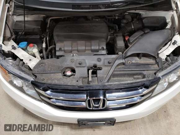 2015 Honda Odyssey EX-L with VIN 5FNRL5H68FB042107, listed as a Copart auction lot 51000525 with 140,793 mi miles and Salvage Title. Bid and sale history available at DreamBid. Image 12.