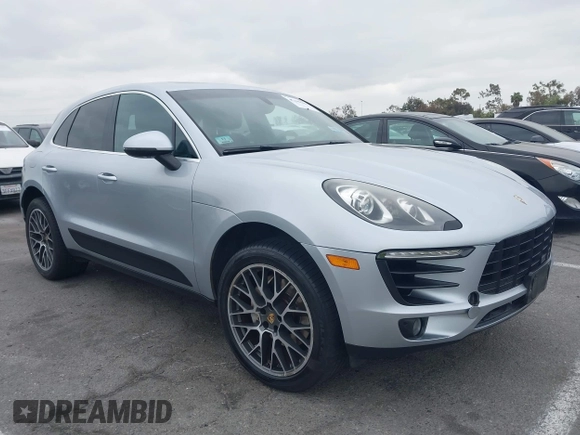 2015 Porsche Macan S with VIN WP1AB2A50FLB58087, listed as a IAAI auction lot 42108660 with 91,894 mi miles. Bid and sale history available at carsss.com. Image 1.