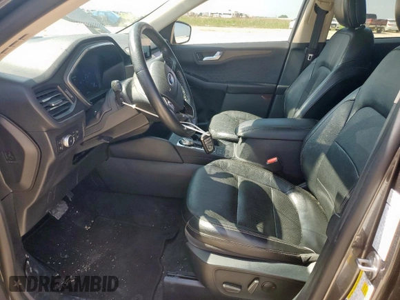 2020 Ford Escape Titanium Hybrid z VIN 1FMCU0DZ1LUC38345, wystawiony jako Copart lot #59628985 z przebiegiem 86 917 mil mil oraz Szkoda całkowita • Salvage title. Historia ofert i sprzedaży dostępna na DreamBid. Obrazek 7.