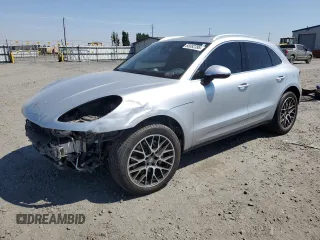 2018 Porsche Macan S with VIN WP1AB2A5XJLB32797, listed as a Copart auction lot 65082395 with 84,453 mi miles and Salvage title. Bid and sale history available at DreamBid. Image 1.