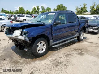 2004 Ford Explorer Sport Trac XLS with VIN 1FMZU67K54UB69155, listed as a Copart auction lot 63717724 with 121,417 mi miles and Salvage Title. Bid and sale history available at carsss.com. Image 1.