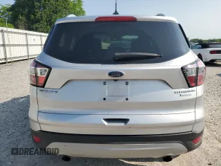 2018 Ford Escape Titanium z VIN 1FMCU0J95JUD44086, wystawiony jako Copart lot #58978865 z przebiegiem 90 874 mil mil oraz Szkoda całkowita • Salvage title. Historia ofert i sprzedaży dostępna na DreamBid. Obrazek 6.