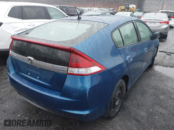 2012 Honda Insight with VIN JHMZE2H31CS005377, listed as a IAAI auction lot 41879122 with 136,646 mi miles and . Bid and sale history available at DreamBid. Image 4.