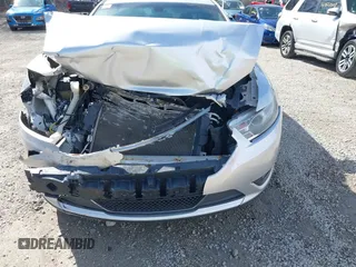 2013 Ford Taurus Limited with VIN 1FAHP2F82DG191141, listed as a IAAI auction lot 41858768 with 172,732 mi miles and . Bid and sale history available at DreamBid. Image 6.