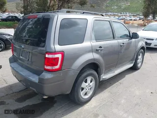 2010 Ford Escape XLT with VIN 1FMCU0D73AKC67711, listed as a IAAI auction lot 41891915 with 254,378 mi miles. Bid and sale history available at carsss.com. Image 4.