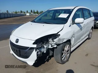 2012 Mazda 5 Touring with VIN JM1CW2CL7C0140452, listed as a IAAI auction lot 41970209 with 92,069 mi miles and . Bid and sale history available at DreamBid. Image 2.