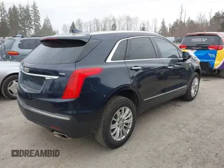 2017 Cadillac XT5 FWD with VIN 1GYKNARS2HZ188557, listed as a IAAI auction lot 41840764 with 104,524 mi miles. Bid and sale history available at carsss.com. Image 4.