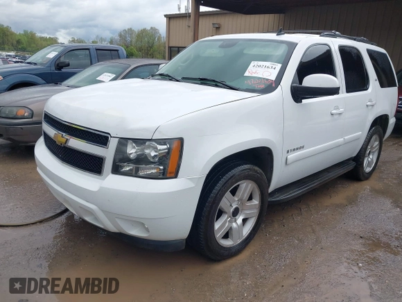 2007 Chevrolet Tahoe LT z VIN 1GNFC13J37R113756, wystawiony jako IAAI lot #42021634 z przebiegiem 247 631 mil mil oraz . Historia ofert i sprzedaży dostępna na DreamBid. Obrazek 2.
