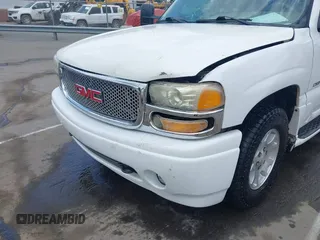 2005 GMC Yukon Denali z VIN 1GKEK63U55J259803, wystawiony jako IAAI lot #42126835 z przebiegiem 199 762 mil mil oraz . Historia ofert i sprzedaży dostępna na DreamBid. Obrazek 6.