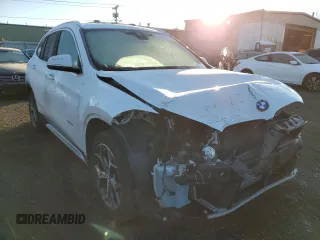 2017 BMW X1 xDrive28i with VIN WBXHT3C39H5F84369, listed as a Copart auction lot 68940992 with 92,054 mi miles. Bid and sale history available at carsss.com. Image 4.