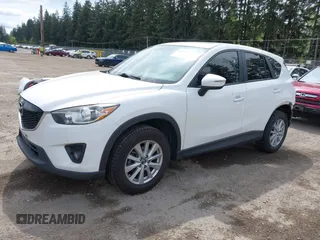2015 Mazda CX-5 Touring with VIN JM3KE4CY4F0488484, listed as a IAAI auction lot 42115093 with 156,344 mi miles. Bid and sale history available at carsss.com. Image 23.