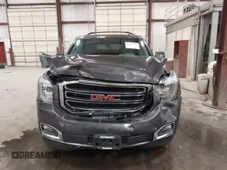 2016 GMC Yukon SLT z VIN 1GKS2BKC2GR320923, wystawiony jako IAAI lot #42196868 z przebiegiem 134 754 mil mil oraz . Historia ofert i sprzedaży dostępna na DreamBid. Obrazek 12.