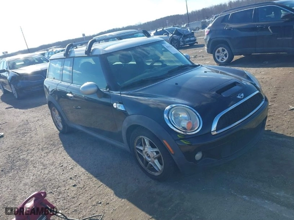 2009 MINI Cooper Clubman S with VIN WMWMM33559TP74672, listed as a IAAI auction lot 41352619 with 163,129 mi miles. Bid and sale history available at carsss.com. Image 1.