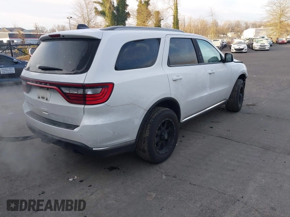 2015 Dodge Durango SXT with VIN 1C4RDJAG1FC745974, listed as a IAAI auction lot 41392820 with 124,861 mi miles and . Bid and sale history available at DreamBid. Image 4.