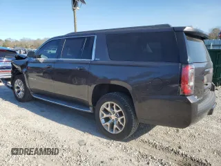 2015 GMC Yukon XL SLT with VIN 1GKS1HKC3FR188825, listed as a Copart auction lot 88904935 with 201,178 mi miles and Salvage Title. Bid and sale history available at carsss.com. Image 2.