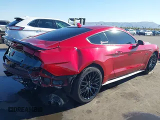 2021 Ford Mustang GT with VIN 1FA6P8CF3M5103948, listed as a IAAI auction lot 41371529 with 67,182 mi miles. Bid and sale history available at carsss.com. Image 4.