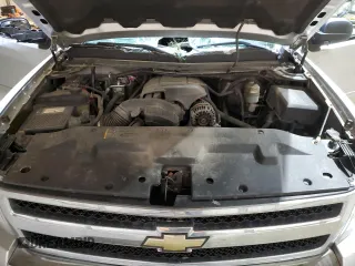2010 Chevrolet Silverado 1500 LS with VIN 1GCSKREA7AZ210438, listed as a Copart auction lot 50062055 with 179,579 mi miles and Salvage Title. Bid and sale history available at DreamBid. Image 11.