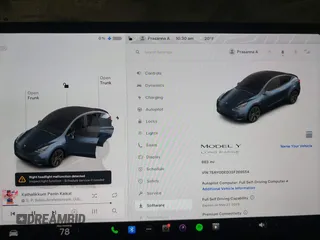 2025 Tesla Model Y Long Range z VIN 7SAYGDED3SF269554, wystawiony jako IAAI lot #41363465 z przebiegiem 883 mil mil oraz . Historia ofert i sprzedaży dostępna na DreamBid. Obrazek 15.