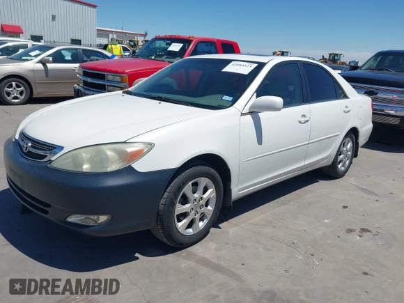 2004 Toyota Camry LE with VIN JTDBE32K840277463, listed as a IAAI auction lot 42080523 with 139,558 mi miles. Bid and sale history available at carsss.com. Image 2.