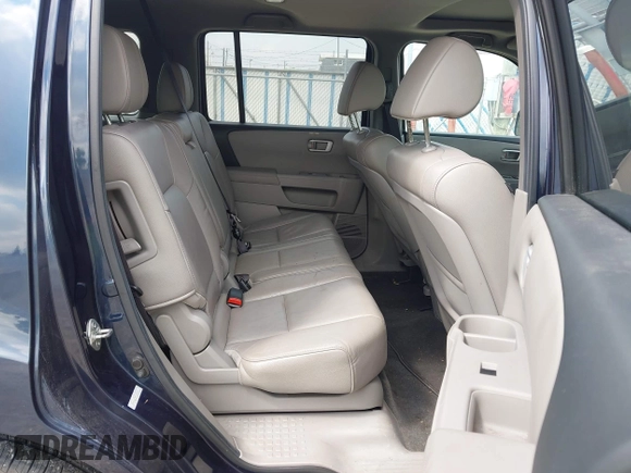 2012 Honda Pilot EX-L with VIN 5FNYF4H79CB004810, listed as a IAAI auction lot 42127547 with 143,461 mi miles and . Bid and sale history available at DreamBid. Image 8.