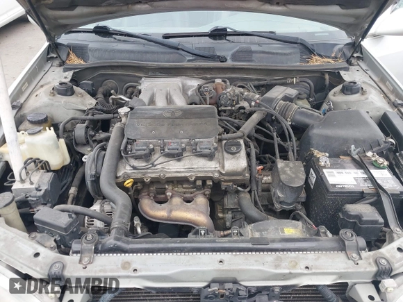 2001 Toyota Camry LE z VIN 4T1BF28K71U127407, wystawiony jako IAAI lot #42247606 z przebiegiem 289 995 mil mil oraz . Historia ofert i sprzedaży dostępna na DreamBid. Obrazek 10.