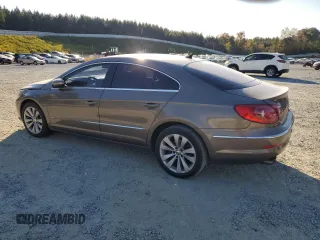 2010 Volkswagen CC Sport with VIN WVWMN7AN3AE541988, listed as a Copart auction lot 77670794 with 100,277 mi miles and Salvage Title. Bid and sale history available at DreamBid. Image 2.