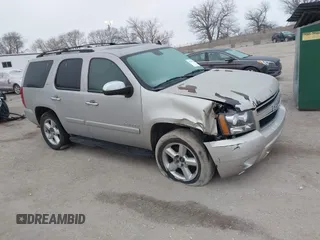 2007 Chevrolet Tahoe LTZ z VIN 1GNFK13037J332824, wystawiony jako IAAI lot #41505874 z przebiegiem 219 823 mil mil oraz . Historia ofert i sprzedaży dostępna na DreamBid. Obrazek 1.