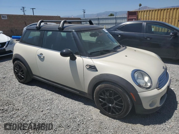 2013 MINI Hardtop with VIN WMWSU3C51DT682510, listed as a Copart auction lot 63879335 with 227,748 mi miles and Clean title. Bid and sale history available at DreamBid. Image 4.