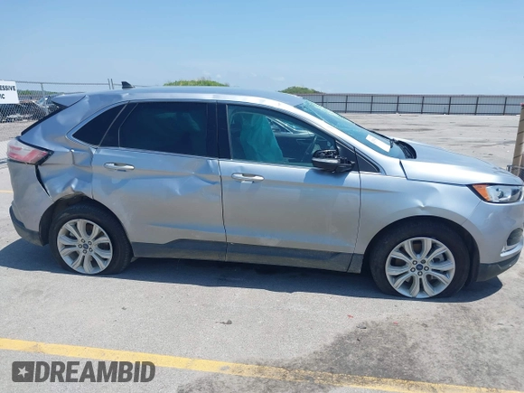 2022 Ford Edge Titanium with VIN 2FMPK4K96NBA41746, listed as a IAAI auction lot 42551594 with 86,730 mi miles and . Bid and sale history available at DreamBid. Image 13.