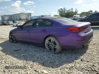 2013 BMW 6 Series 640i with VIN WBA6A0C58DDZ03250, listed as a Copart auction lot 52081974 with 146,345 mi miles and Salvage Title. Bid and sale history available at DreamBid. Image 2.
