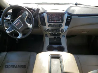 2015 GMC Yukon SLT with VIN 1GKS1BKC7FR120802, listed as a Copart auction lot 87430984 with 191,829 mi miles and Salvage Title. Bid and sale history available at carsss.com. Image 8.