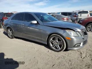2011 Mercedes-Benz E 550 Luxury with VIN WDDHF7CB8BA305630, listed as a Copart auction lot 41521955 with 141,587 mi miles and Salvage Title. Bid and sale history available at DreamBid. Image 4.