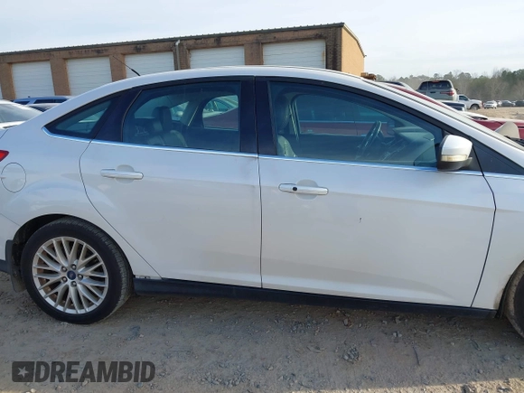 2013 Ford Focus Titanium with VIN 1FADP3J22DL167324, listed as a IAAI auction lot 41616927 with 127,259 mi miles and . Bid and sale history available at carsss.com. Image 13.