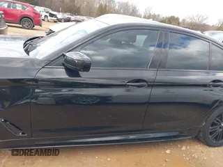2019 BMW 5 Series M550i xDrive with VIN WBAJB9C56KB464957, listed as a IAAI auction lot 41729334 with Not provided miles and . Bid and sale history available at DreamBid. Image 14.