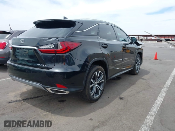 2021 Lexus RX 350 with VIN 2T2HZMDA5MC263109, listed as a IAAI auction lot 42249633 with 53,375 mi miles and . Bid and sale history available at DreamBid. Image 4.