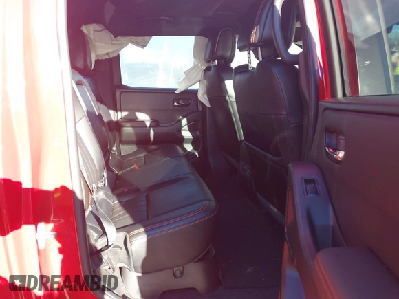 2024 Nissan Frontier SV with VIN 1N6ED1EK6RN609634, listed as a IAAI auction lot 41187993 with 21,034 mi miles and . Bid and sale history available at DreamBid. Image 8.