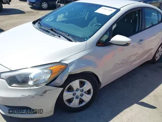 2014 Kia Forte LX with VIN KNAFK4A63E5115830, listed as a IAAI auction lot 42087188 with 111,660 mi miles. Bid and sale history available at carsss.com. Image 6.