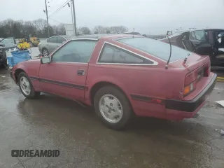 1985 Nissan 300ZX z VIN JN1HZ14S2FX092175, wystawiony jako Copart lot #45348155 z przebiegiem 162 305 mil mil oraz Czysty tytuł • Clean title. Historia ofert i sprzedaży dostępna na DreamBid. Obrazek 2.