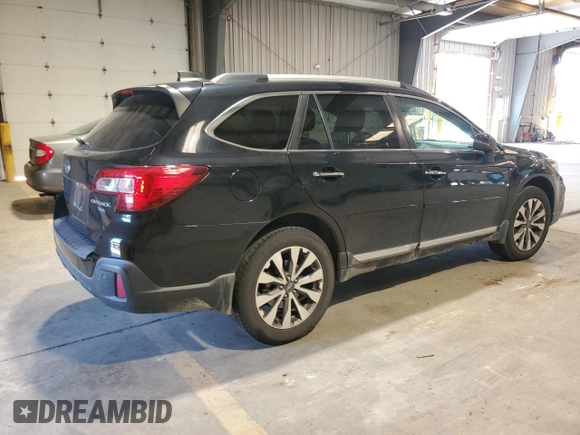 2018 Subaru Outback Touring with VIN 4S4BSETC5J3359796, listed as a Copart auction lot 65845795 with 106,992 mi miles and Salvage title. Bid and sale history available at DreamBid. Image 3.